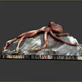 Red Octopus Model With Long Tentacles On Rock Base And Small Decorations