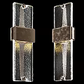 Two Modern Metallic Textured Wall Lamps With Warm Yellow Light And Sleek Design