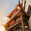 Exquisite Traditional Chinese Wooden Carved Paifang Eave Architectural Component With Surrounding Modern Building Facade