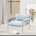Modern Light Blue Single Sofa with Metal Frame and Cat Potted Plant on Wooden Floor