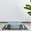 Garden Decorative Structure With Blue Top And White Railings By Green Tree On Paved Ground