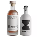 Creative Wine Bottles and Glasses Showcase with Unique Label Designs and Bottle Styles