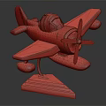 Light Blue and Dark Blue Passenger Airplane Model with Propeller on Wooden Base