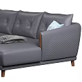 Gray Leather Sectional Sofa With Decorative Pillows Throw Blanket And Wooden Legs