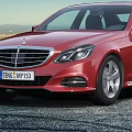 Red Mercedes Benz Sedan Against Urban Night View