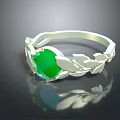 Elegant Green Gemstone Ring With Silver Leaf Design And Intricate Setting