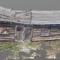 Dilapidated Old Wooden House With Broken Roof Weathered Planks And Overgrown Grass