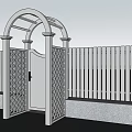 White Arched Entrance Gate With Picket Fence And Stone Paved Pathway