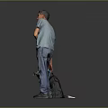 Cute black and white puppy being walked with yellow leash by man in gray background