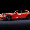Red Luxury Sports Estate Car With Sleek Body And Black Alloy Wheels