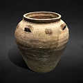 Ancient Pottery Jar With Textured Surface Square Handles And Worn Details Against Dark Background