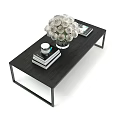 Black Modern Dining Table with Minimalist Design White Flower Bouquet Books and Small Cup