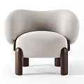 Light Beige Velvet Armchair With Rounded Armrests And Dark Wooden Cylindrical Legs