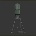 Green Cylindrical Equipment with Metal Tripod Base and Cable Nearby