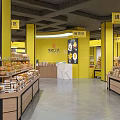Supermarket Department Store Interior with Yellow Pillars Imported Snacks Candy Pastry Areas and Product Shelves
