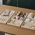 Neatly Arranged Jewelry Storage Boxes With Compartments For Rings Earrings Necklaces And Watches