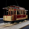 Vintage Streetsville 1889 Tram Model Red Beige Body Windows Platform Black Background