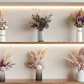 Dried Flower Bouquets In White Gray Glass Vases On Wooden Shelves With Wall Lighting