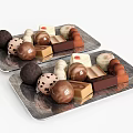 Delicious Assorted Chocolate Treats on Silver Trays with Various Shapes and Colors
