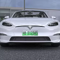White Tesla Model S Sedan With Streamlined Body Black Roof And Modern Alloy Wheels
