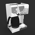 White And Black Coffee Maker With Black Pot And Control Panel As Kitchen Appliance