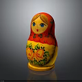 Traditional Matryoshka Doll With Red Yellow Floral Patterns And Blue Eyes