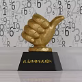 Three Golden Silver and Crystal Trophies with Black Bases and Engraved Team Recognition Text