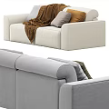 Cream And Light Gray Two Seater Sofa With Colorful Pillows And Soft Blankets