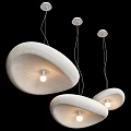 Textured White Cloud-shaped Modern Pendant Lights Hanging with Warm Glow in Contemporary Space
