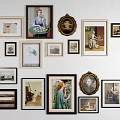 Gallery Wall With Framed Artworks And Photos In Various Sizes Shapes On White Striped Wall