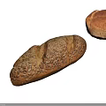 Assorted Fresh Bread Varieties Including Sesame Loaf And Round Cross Pattern Loaf