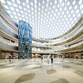 Bright Spacious Modern Shopping Mall Hall With Lattice Glass Dome And Central Glass Elevator