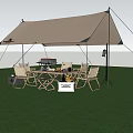 Scenic Outdoor View With Brown Tarp Tent Folding Chairs Table And Grill On Green Grass