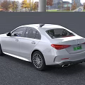 White Mercedes Benz Sedan With Sleek Front Design And Alloy Wheels