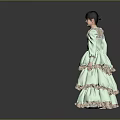 Young Girl In Light Green Layered Dress With Lace Collar Standing On Gray Background