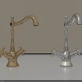 Elegant Gold And Silver Faucets With Double Handle Design On Countertop 3d model