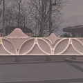 Illuminated Building Exterior Wall With Curved Design At Milles Land Plaza Surroundings