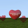 Roadside Welcome Heart Sculpture With Green Grass And Blue Sky Background