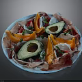 Fresh Avocado Halves With Prosciutto Slices Papaya Chunks And Fresh Herbs On Blue Plate