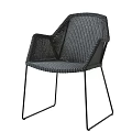 Modern Outdoor Wicker Leisure Chair With Black Metal Frame And Sleek Design
