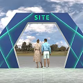 People Standing In Front Of Blue Geometric Event Gateway With Green SITE Lettering