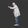 Man in White Chef Hat and White Coat with Blue Jeans Standing on Gray Background
