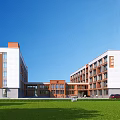 School Building Exterior Featuring White Orange Walls Green Lawn Blue Sky And Red Car