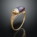 Elegant Gold Ring With Purple Oval Gemstone And Intricate Shiny Band Design
