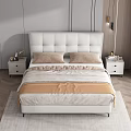 Elegant Modern Double Bed With White Leather Upholstered Headboard Brown Pillows And Beige Blanket