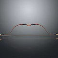 Traditional Wooden Bow Weapon With Red Black Accents Curved Design String And Reflective Surface