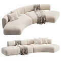 Modern Beige Curved Two Seater Sofa With Soft Fabric Cushions And Plaid Blanket