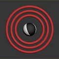 Red Concentric Rings Surrounding Black And White Sphere On Black Background