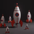 Cute White and Red Rocket Shaped Dolls in Various Sizes with Round Windows 3d model