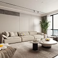 Modern Living Room Interior Design With Beige Sofa Round Coffee Table And Green Plant